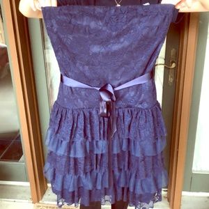 Shimmery navy blue lace, ruffled bottom dress.